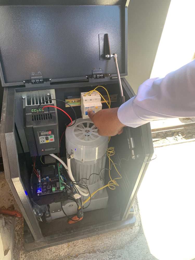 Inside the sliding gate motor housing: motor, drive controller, and control board